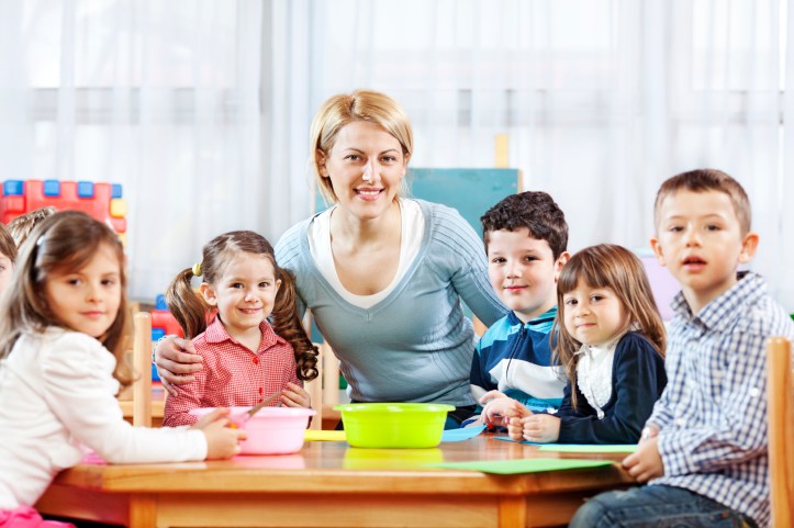 Preschool students with teacher in classroom